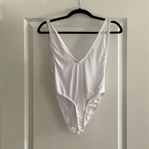 Like new Nasty Gal deep-v bodysuit - Picture 1 of 3